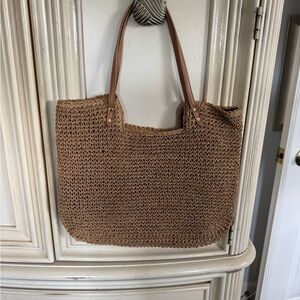 Rattan tote with top zip.  NWOT